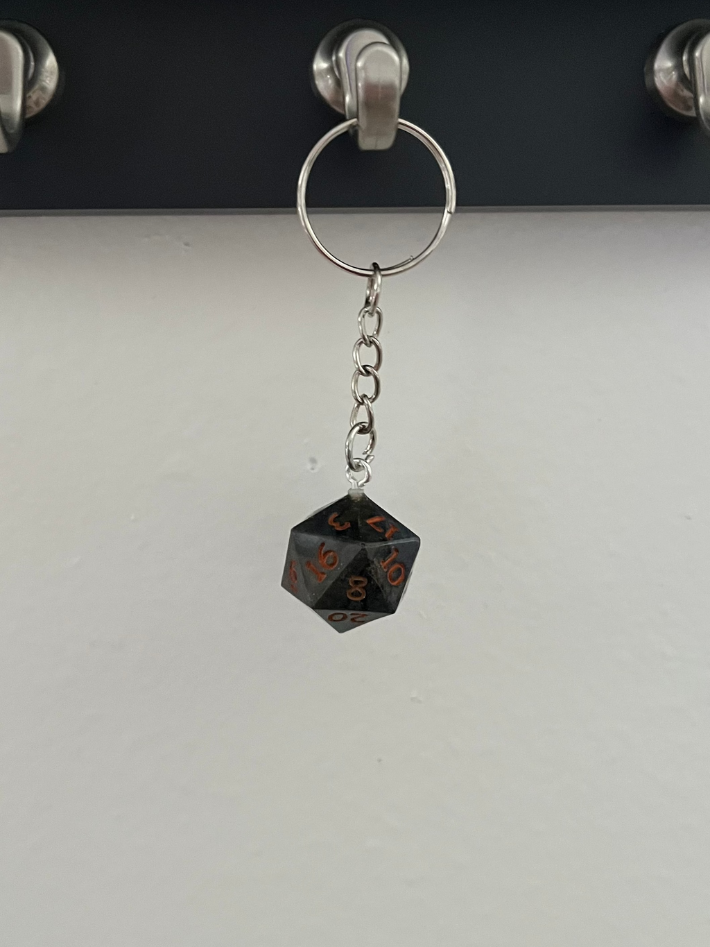 D20 Handmade Keychain - Black and Orange Die with Orange Numbers
